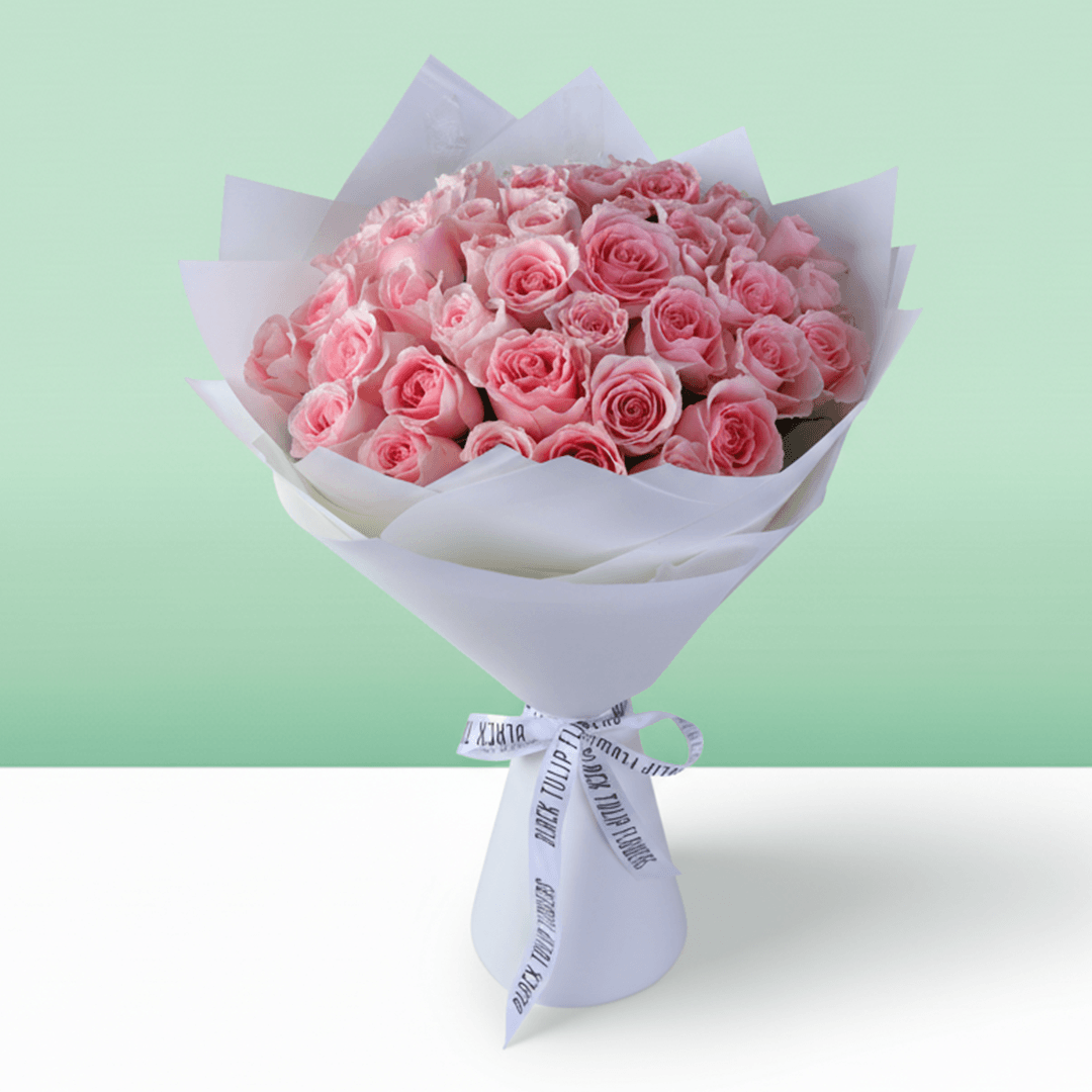 Mom’s Pink Rose Charm Bouquet with 30 fresh pink roses in soft wrapping
