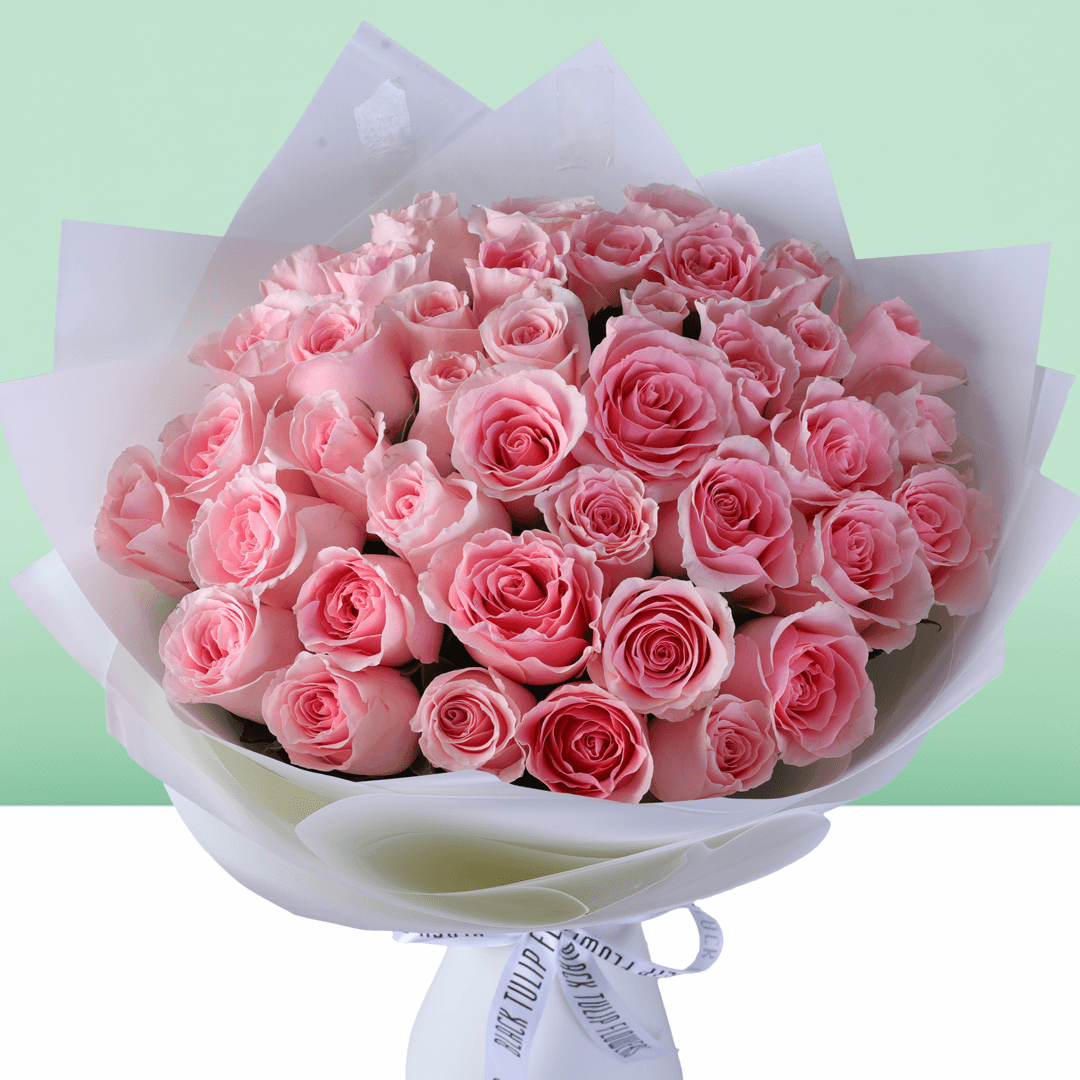 Mom’s Pink Rose Charm Bouquet with 30 fresh pink roses in soft wrapping