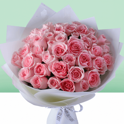 Mom’s Pink Rose Charm Bouquet with 30 fresh pink roses in soft wrapping