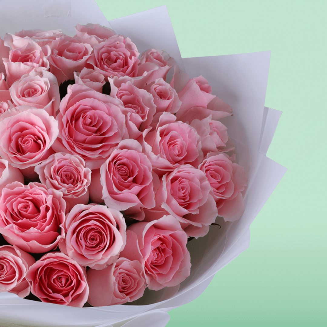 Mom’s Pink Rose Charm Bouquet with 30 fresh pink roses in soft wrapping
