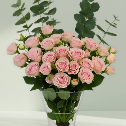 Pink Roses with Eucalyptus Vase arranged with 20 pink roses and eucalyptus