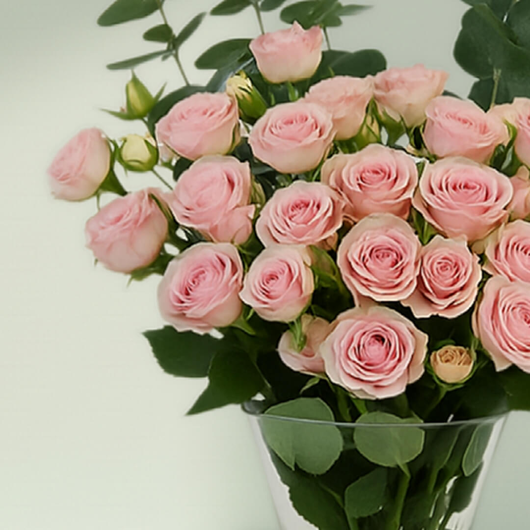 Pink Roses with Eucalyptus Vase arranged with 20 pink roses and eucalyptus