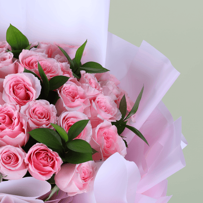 Mother’s Day Pink Rose Delight bouquet with 30 pink roses and green leaves