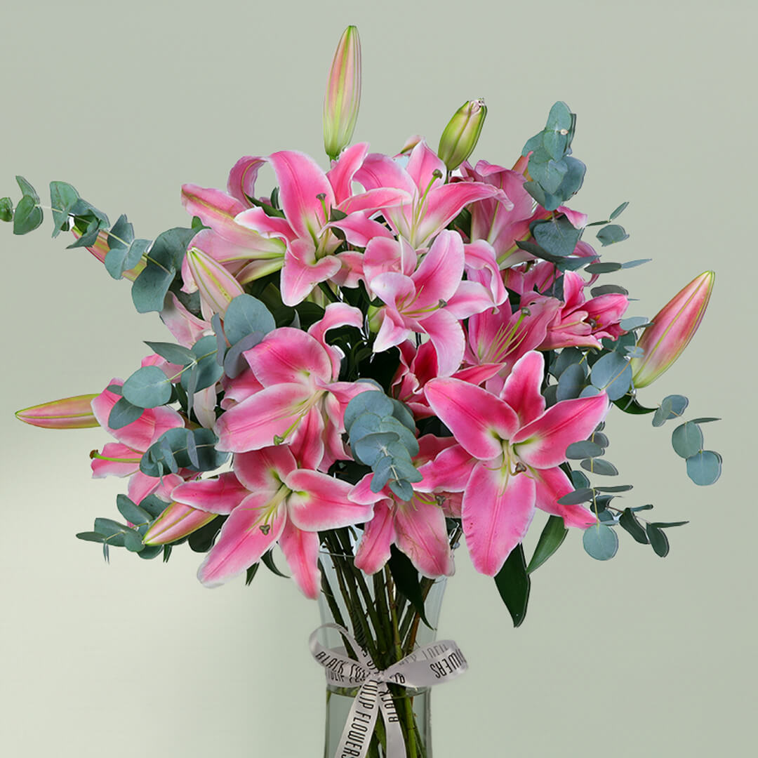 Pink Lily and Eucalyptus Flower Arrangement in Glass Vase