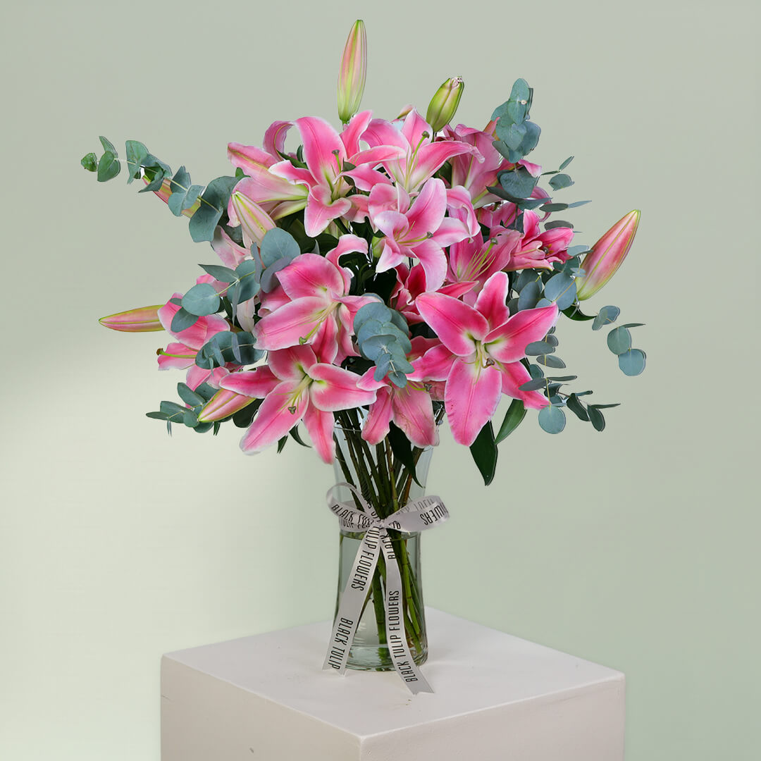 Pink Lily and Eucalyptus Flower Arrangement in Glass Vase