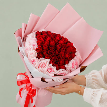 Pink and red hand bouquet of fresh flowers for gifting