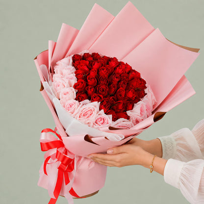 Pink and red hand bouquet of fresh flowers for gifting