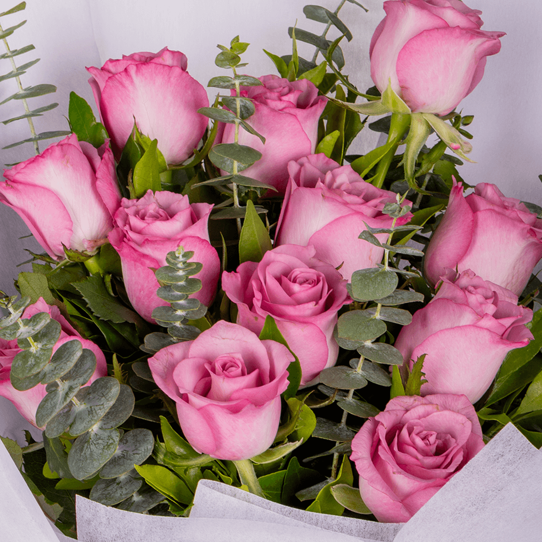 Purple Roses Bouquet arranged with 12 purple roses and eucalyptus