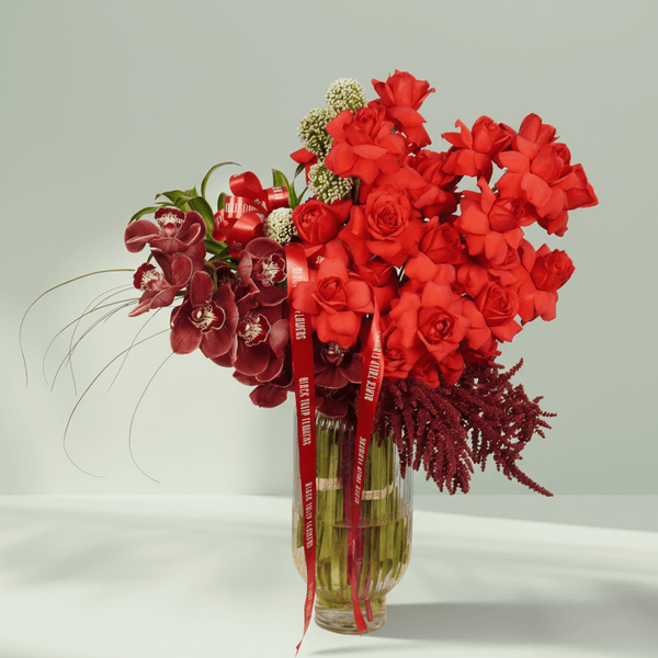 Premium red orchid and rose floral vase with cymbidium Amaranthus and allium bullet
