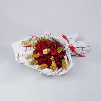 Bouquet of 26 red Roses with Eucalyptus in red and gold Korean-style wrapping.