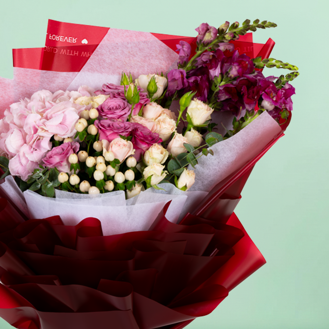 Mixed Hydrangea, Rose, Eustoma and Snapdragon bouquet in red Korean-style wrapping.