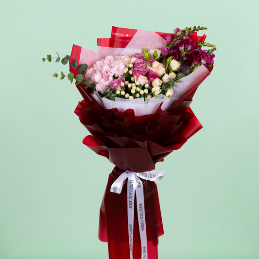 Mixed Hydrangea, Rose, Eustoma and Snapdragon bouquet in red Korean-style wrapping.