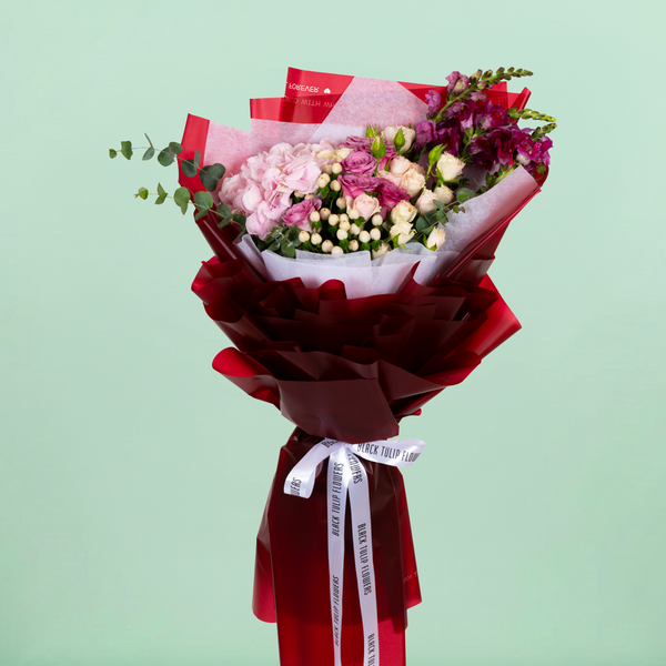 Mixed Hydrangea, Rose, Eustoma and Snapdragon bouquet in red Korean-style wrapping.