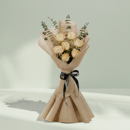 6 peach roses bouquet with eucalyptus in green wrapping