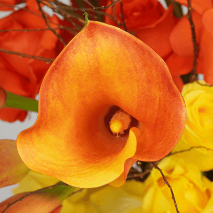 Saffron Surge calla lily rose vase with lilies and fillers in premium glass vase