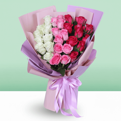 30–35 mixed white pink and red roses bouquet in soft wrapping