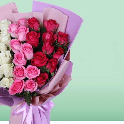 30–35 mixed white pink and red roses bouquet in soft wrapping