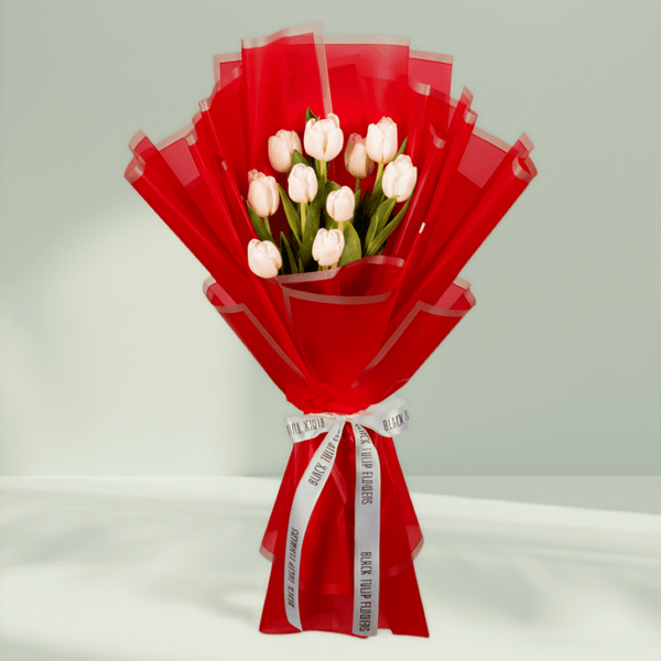 10 Stem White Tulips Bouquet arranged with white tulips in bold red wrapping