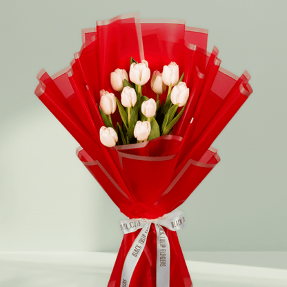 10 Stem White Tulips Bouquet arranged with white tulips in bold red wrapping