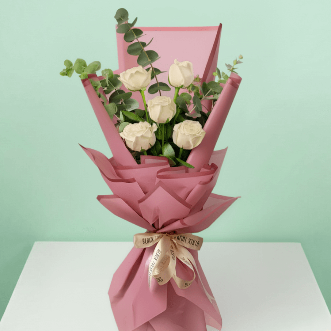 5 white roses bouquet with eucalyptus in Korean-style wrapping