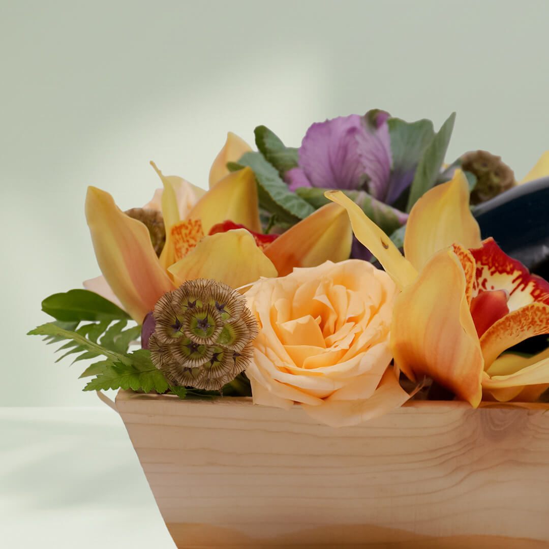 Vino Petals bouquet with 16 assorted Cymbidium, Scabiosa, roses, cabbage flowers and leather leaf, paired with premium non-alcoholic wine 750ml.