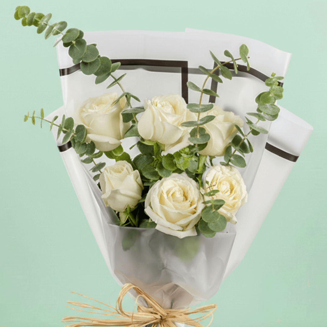 6 white roses bouquet with eucalyptus in Korean-style wrapping