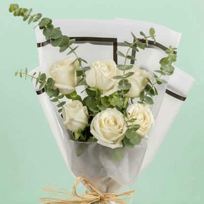 6 white roses bouquet with eucalyptus in Korean-style wrapping
