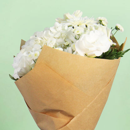 White mixed flower bouquet with fresh blooms for elegant gifting and special occasions