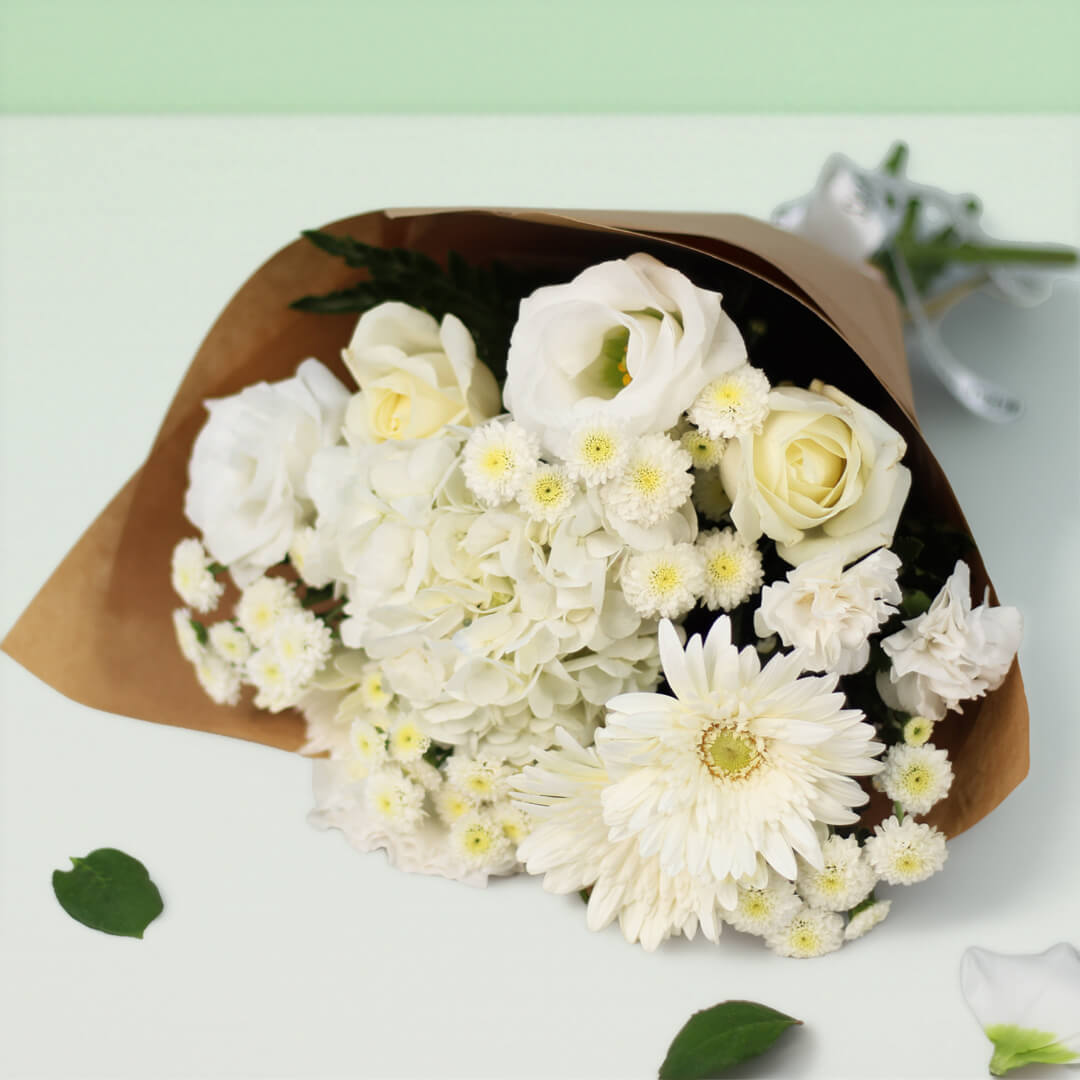 White mixed flower bouquet with fresh blooms for elegant gifting and special occasions