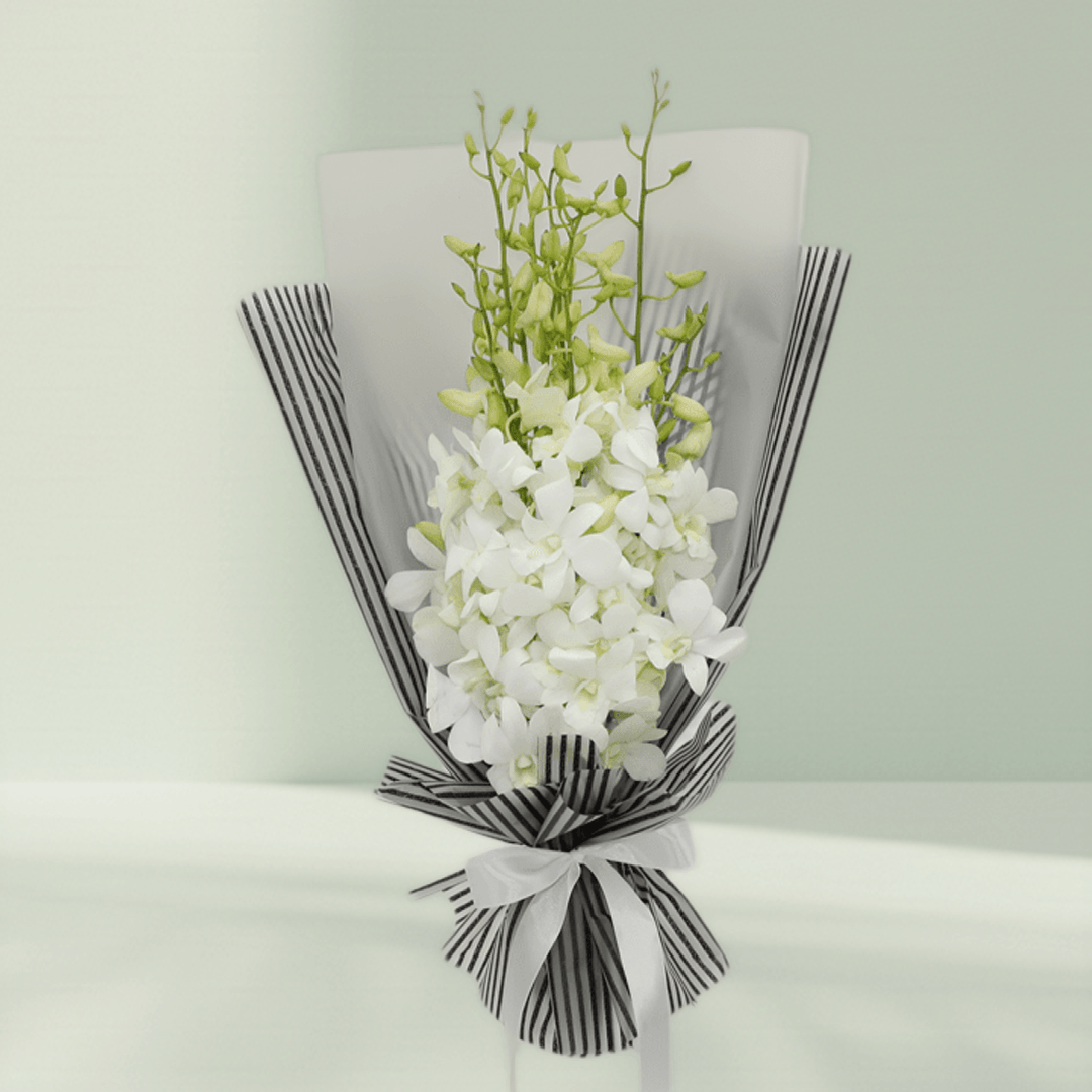 White orchid bouquet wrapped in black-and-white striped non-woven paper