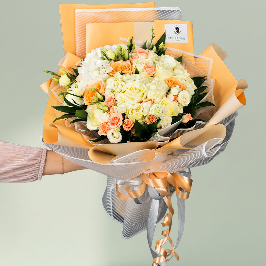 Exotic mixed flower bouquet with roses, Eustoma and spray roses in Korean wrapping