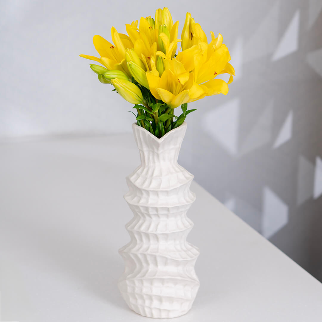 Asiatic lily flowers with broad petals and large open blooms arranged as fresh cut stems