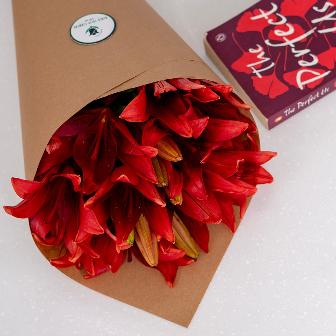 Asiatic lily flowers with broad petals and large open blooms arranged as fresh cut stems