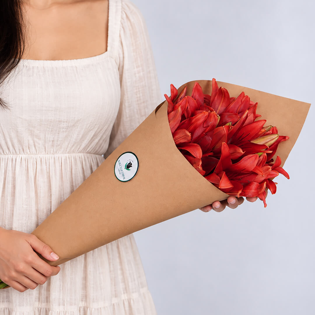 Asiatic lily flowers with broad petals and large open blooms arranged as fresh cut stems