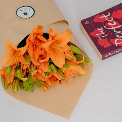 Asiatic lily flowers with broad petals and large open blooms arranged as fresh cut stems