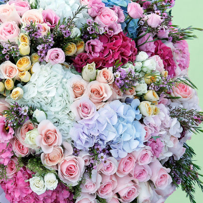 Assorted fresh floral wrap bouquet with seasonal blooms and elegant wrapping