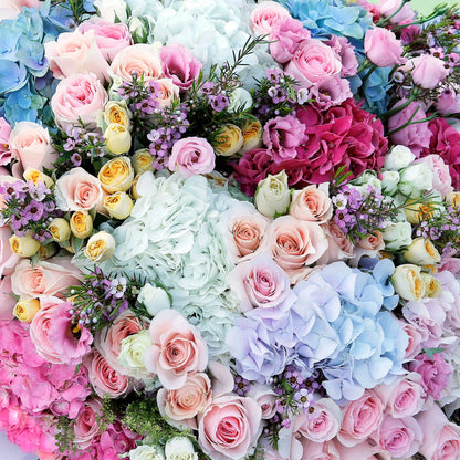 Assorted fresh floral wrap bouquet with seasonal blooms and elegant wrapping