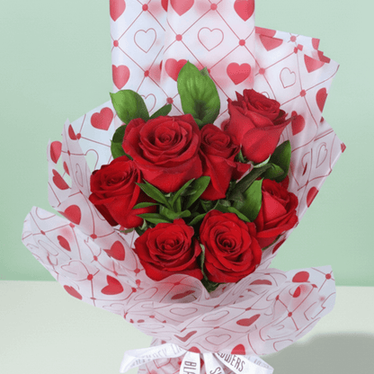 Blush Love 7 Red Rose Bouquet arranged with 7 red roses with fresh greenery
