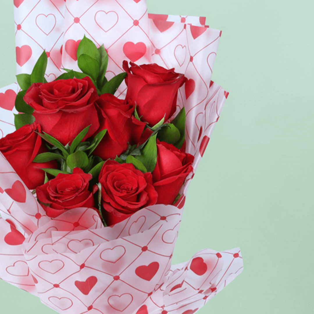 Blush Love 7 Red Rose Bouquet arranged with 7 red roses with fresh greenery