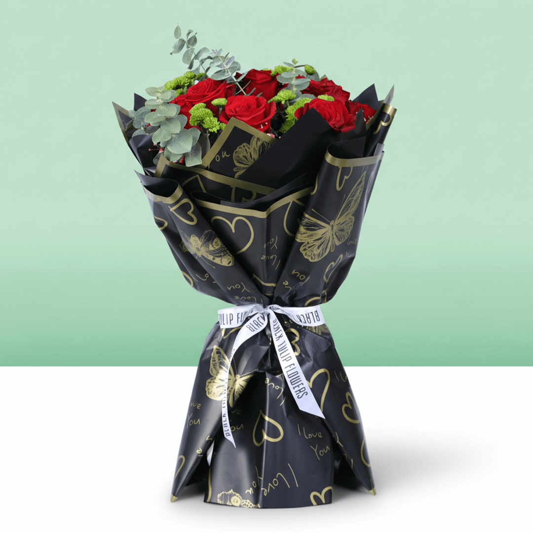 Ruby Charm Mixed Valentine Bouquet arranged with mixed fresh blooms in rich red tones