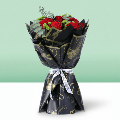 Ruby Charm Mixed Valentine Bouquet arranged with mixed fresh blooms in rich red tones