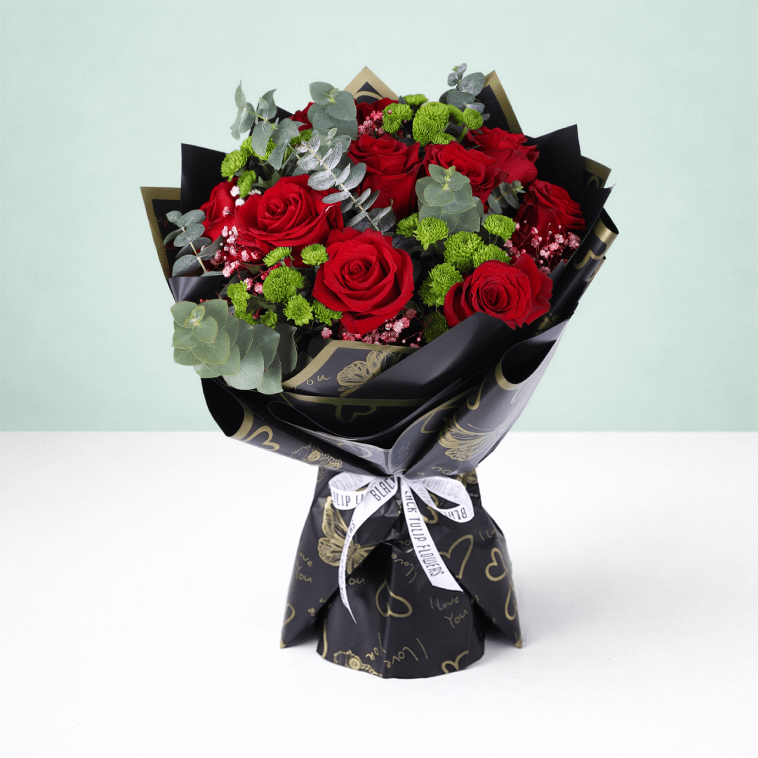 Ruby Charm Mixed Valentine Bouquet arranged with mixed fresh blooms in rich red tones