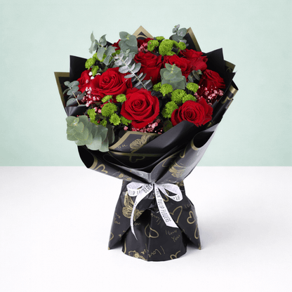 Ruby Charm Mixed Valentine Bouquet arranged with mixed fresh blooms in rich red tones