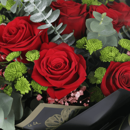 Ruby Charm Mixed Valentine Bouquet arranged with mixed fresh blooms in rich red tones