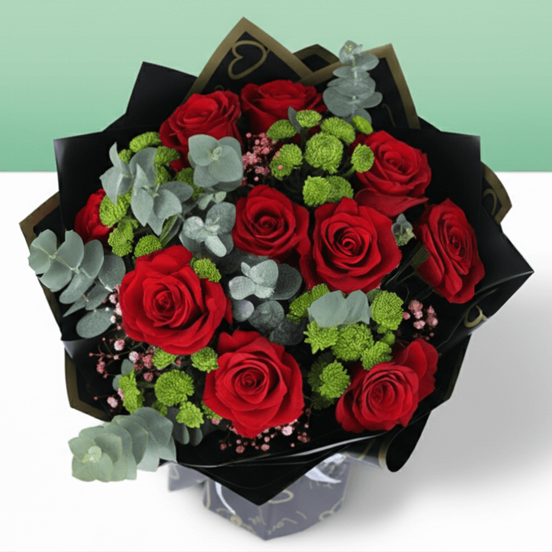 Ruby Charm Mixed Valentine Bouquet arranged with mixed fresh blooms in rich red tones