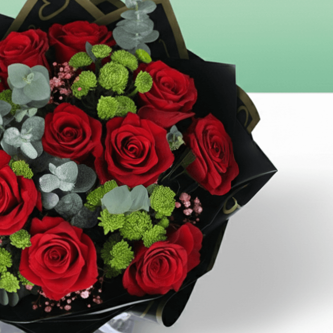 Ruby Charm Mixed Valentine Bouquet arranged with mixed fresh blooms in rich red tones