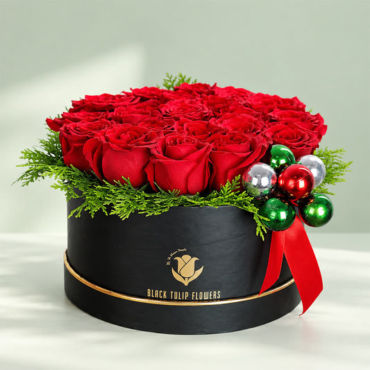 Box of red roses Christmas collection featuring elegant red rose arrangement for festive flower gifting
