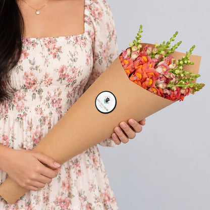 Snapdragon cut blooms presented in brown paper wrapping