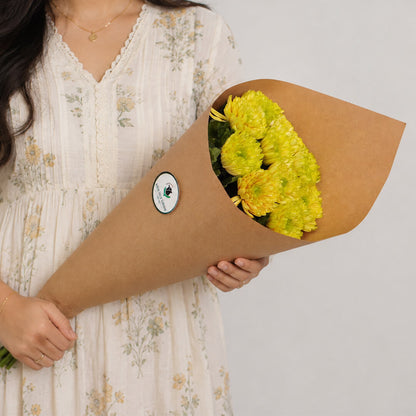Fresh Disbud flowers neatly arranged and wrapped in brown paper