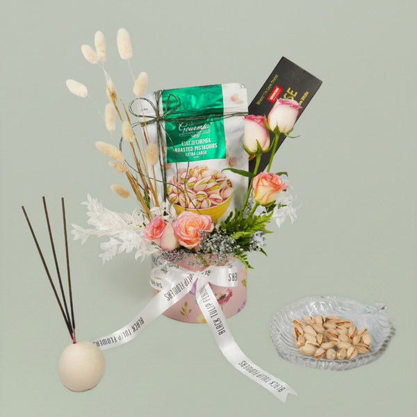 Diwali Bounty hamper with roses, dried flowers, pistachios and festive Moksh agarbati gifts